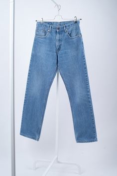 STYLE: 00505 0203. SIZE: label says W31/L31, fits W30/L30.5 (hemmed). MATERIAL: 100% cotton. COLOR: light blue. FEATURES: these classic straight leg Levi's 505 jeans in light blue wash feature zip fly and copper rivets, classic 5 pocket design, red tab on the back pocket, regular fit and high rise waist. Looks similar to the 501®, but with a zip-fly. This pair comes from the 90's what guarantees a premium quality denim that will serve a lifetime. Originally made for men, but fits perfectly women Classic Straight Washed Blue Bottoms, Classic Washed Blue Straight Bottoms, Classic Washed Blue Everyday Bottoms, Classic Washed Blue Bottoms For Everyday, Classic Fitted Washed Blue Jeans, Classic Light Wash Cotton Bottoms, Classic Straight Fit Blue Bottoms, Classic Blue Straight Fit Bottoms, Classic Washed Blue Cotton Jeans