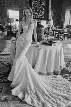 black and white photo of a woman in a wedding dress