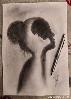 a pencil drawing of a woman's profile