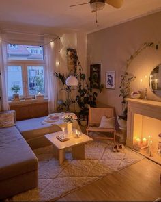 a living room filled with furniture and a fire place