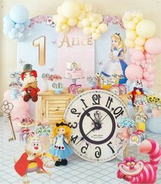 there is a large clock surrounded by balloons and other items in the room with it