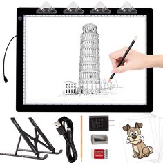 a person is drawing on a tablet with a pen and some other items around it