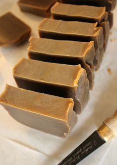 several pieces of chocolate sitting on top of a table