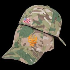 a camo hat with an american flag on the front and gold eagle embroidered on the side