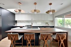 the kitchen is clean and ready to be used as a dining room or family room