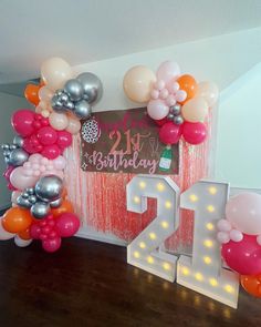 a birthday decoration with balloons and the number twenty two