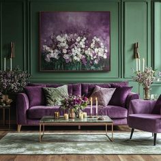 a living room with green walls, purple couches and candles on the coffee table