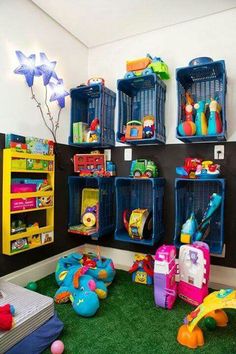 a room filled with lots of toys on top of green carpet