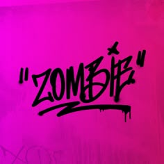 graffiti written on the side of a pink wall that says, zombie with an airplane flying over it