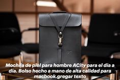 The elegant and handcrafted backpack is handmade in high-quality leather from Spain in black. This men's bag is ideal to give to a friend, as a personalized gift for his anniversary. Handmade Bag, Leather Briefcase, Handmade Bags, High Quality Leather, Business Man, Leather Backpack, Leather Men, Macbook