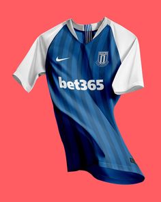 a blue and white soccer jersey on a pink background