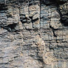 some rocks that have been carved into the side of a mountain