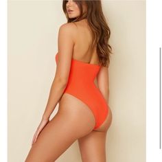 Brand New Lulu's Swimsuit In A Beautiful Bright Orange Summer Color. Strapless With Knot In The Front Style, Has The Jelly Lining To Keep It In Place. Beach Bandeau Stretch Bodysuit, Beach Bandeau Bodysuit With Stretch, Stretch Bandeau Bodysuit For Beach, Strapless Beachwear Bodysuit For Beach, Strapless Solid Color Bodysuit For Beach, Solid Color Strapless Bodysuit For Swimming, Solid Bandeau Bodysuit For Beach, Solid Bandeau Bodysuit For Swimming, Strapless Solid Color Bodysuit For Swimming