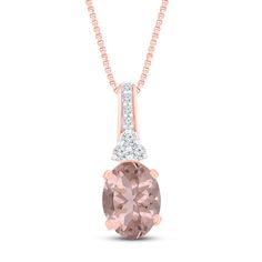 A captivating oval-cut peach natural morganite is the focal point of this spectacular women's necklace. Dazzling white lab-created sapphires adorn the bail to complete the look. Fashioned in 10K rose gold, the 18-inch box chain secures in place with a spring ring clasp. Oval Morganite Jewelry Gift, Oval Morganite Jewelry For Gift, Round Morganite Jewelry With Gemstone Accents, Morganite Jewelry With Gemstone Accents, Oval Necklace With Accent Stones In Fine Jewelry Style, Oval Fine Jewelry Necklace With Accent Stones, Oval Necklace With Accent Stones, Oval Morganite Jewelry With Gemstone Accents, Women's Necklace