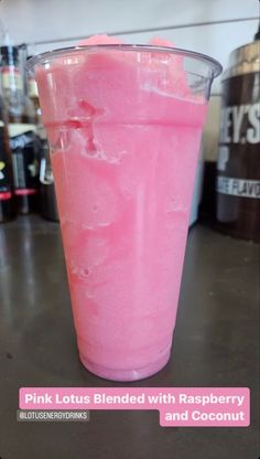 a pink drink with raspberry and coconut