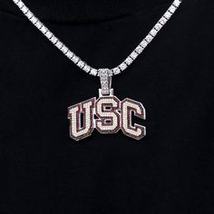 GLD has teamed up with the National Collegiate Athletic Association to introduce the official NCAA Team Pendants. This 14k White Gold piece was meticulously crafted with red and clear hand-set stones to accurately depict the University of Southern California Team logo. Rep your squad with this official pendant of the Trojans! . This product is guaranteed for life - GLD will repair the item should you experience any defects in craftsmanship or breakage. Pendant Specifications - 38mm x 19mm (Width Red Diamond Jewelry With Polished Finish, Trojans Logo, Usc Trojans Logo, Usc Trojans, University Of Southern California, Gold Piece, Vermeil Jewelry, Custom Earrings, Pendant Bracelet