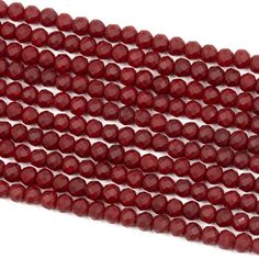 three strands of red glass beads