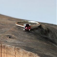 Sterling silver Garnet ring for bridesmaids and anniversary ring, alternative engagement cocktail ring, 92.5% pure silver and natural garnetDescription:I make the gemstones myself for my valued customers so I assure you that the gemstones are NATURAL and are made from ETHICALLY SOURCED ROUGHSThe rest of the ring is made from 925 STERLING SILVER i.e 92.5% pure silver. And it DOESN'T HAVE ANY LEAD OR NICKEL.The gemstones used is a lovely FACETED GARNETI make more than 50 DIFFERENT GEMSTONES. If yo Silver Garnet Ring, Garnet Ring Silver, Silver Bridesmaid, Sterling Silver Garnet Ring, Statement Ring Silver, Garnet Ring, Alternative Engagement Rings, Labradorite Ring, Moonstone Jewelry