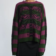 This Oversized Knit Sweater Features A Cool Black Rib Cage Motif On The Front And An Arm Bone Going Down Either Sleeve. Freddy Krueger Vibes. Perfect For Halloween & Spooky Season. Oversized Skeleton Knit Sweater, Skeleton Sweater Green, Oversized Knit Sweater, The Ragged Priest, Rainbow Sweater, Boxy Sweater, Ragged Priest, Sweater Trends, Lace Sweater