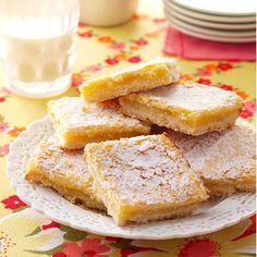 a plate full of sugary shortbreads on a table