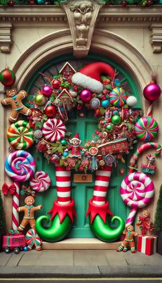 a christmas door decorated with candy canes and stockings on the front entrance to a building