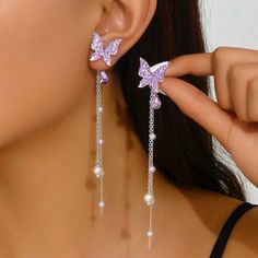 New Purple Butterfly Dangle Bling Earrings Butterfly Rhinestone Earrings With Faux Pearls Measurements In Last Photo Purple Dangle Earrings With Rhinestones, Purple Dangle Rhinestone Jewelry, Purple Rhinestone Dangle Earrings, Purple Butterfly Charm Earrings For Gift, Elegant Purple Butterfly Earrings, Ornate Purple Dangle Earrings, Unique Butterfly-shaped Jewelry With Matching Earrings, Butterfly Rhinestone, Earrings Butterfly