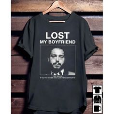 a black t - shirt with the words lost my boyfriend on it and an image of martin