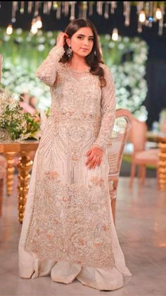 This Dress includes :
 • Shirt with beautiful handwork detailing
 • dhaka pajama , 2 legs flarred Pants with edge finishings
 • Dupatta net wid spray work of pearls n stones Dhaka Pajama, Hand Work Embroidery, Sequence Work, Photo Art Gallery, Formal Attire, Dream Dress, Lace Skirt, Pajamas