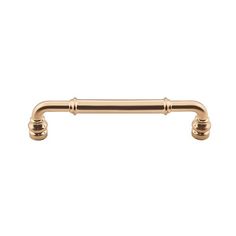 an antique brass cabinet handle on a white background with clipping for text or image