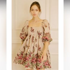 A Pretty Little Floral Mini Dress For Your Next Spring/Summer Event. Dress It Up With Heel Sandals Or Dress It Down With Sneakers. Accessorize It With Your Favorite Pretty Little Headband. It Features A Square Neckline, 3/4 Puffy Sleeves, And Bust Darts. It Also Has A Gathered Waist And A Back Zipper For Of/On Access. 50% Cotton, 50% Polyester. Spring Mini Dress With Puff Sleeves, Summer Mini Dress With Puff Sleeves For Garden Party, Beige Floral Print Dress With Puff Sleeves, Beige Puff Sleeve Mini Dress For Garden Party, Red Puff Sleeve Summer Dress, Red Puff Sleeve Dress For Garden Party, Red Puff Sleeve Mini Dress For Spring, Cute Red Puff Sleeve Dresses, Red Puff Sleeve Dress For Day Out