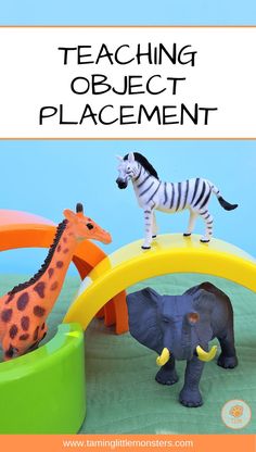 an elephant, giraffe and zebra play set with text reading teaching object placement