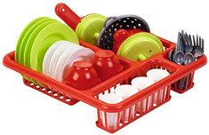 a red dish rack filled with dishes and utensils