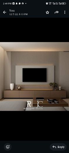 an image of a living room with a tv on the wall