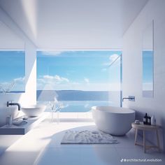 a large white bath tub sitting next to two sinks