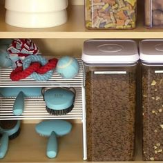 the shelves are filled with different types of dog food and toys for dogs to play in