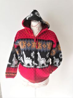 "Vintage Lama Patterned Fluffy Wool cardigan hoody with Zipper closure Lovely soft knit Cardigan in multi coloured striped wool knit. Long sleeves with zip opening. Hood Side pockets This sweater will keep you warm and toasty during chilly evenings. * ALY MARKA * Made in Ecuador * 100% wool * Size Small Please see measurements ( Maneken size is M) * Great vintage condition. Measurements: Shoulder to shoulder: 20\"/ 51 cm Pit to pit: 19''/ 48 cm Arm's length from neck: 23,5\"/ 60 cm Sleeve: 18\"/ Multicolor Winter Hooded Jacket With Drawstring, Warm Multicolor Winter Sweater, Hooded Wool Cardigan For Winter, Winter Knitted Hooded Jacket, Multicolor Winter Hoodie Outerwear, Multicolor Hooded Jacket For Cold Weather, Wool Hooded Sweater For Winter, Hooded Wool Sweater For Winter, Multicolor Hooded Jacket For Cold Winter Weather