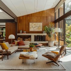 a living room filled with lots of furniture next to a fire place in a house