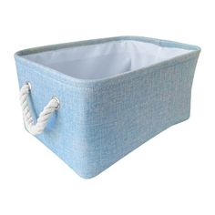 a blue storage basket with rope handles