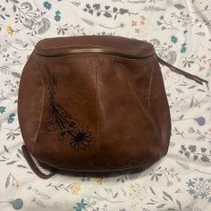 Beautiful Color And Cute Embossed Flowers- Hobo River Backpack. 100% Genuine Leather, No Rips Or Tears On The Inside Or Out, The Lining Is In Great Condition. I Just Don’t Use It Anymore. Non Smoking Home. Brown Leather Pouch Backpack, Brown Leather Backpack For Errands, Brown Backpack With Removable Pouch For Errands, Brown Leather Pouch Backpack For Daily Use, Chestnut Brown Color, Hobo Bags, Chestnut Brown, Just Don, Chestnut