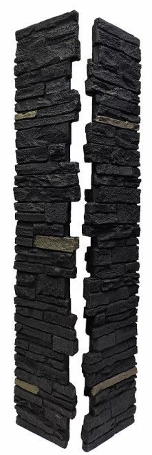 two pieces of black rock stacked on top of each other