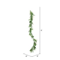 a long green plant hanging from the side of a tall pole with numbers on it