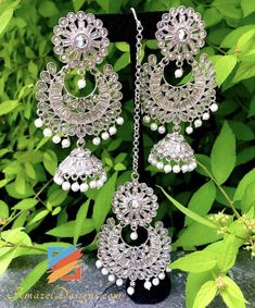 Silver Earrings with Jhumki and Tikka Set. 📦Unmatched FREE Worldwide Shipping EXPLORE more Maang Tikka Sets and Tikka Set Punjabi Match with our pretty Single Line Necklaces 💁🏻‍♀️Rupi, Canada ⭐️⭐️⭐️⭐️⭐️ Hi Kiran, I discovered your website on Friday. I was looking for some jewellery after spending a day in Brampton looking for something reasonable and elegant. Didn't find much so I went online and was surprised we had one in our own town. You need to make yourself more around Oakville. ⭐️⭐️⭐️⭐ Luxury Silver Chandbali Tikka, Luxury Silver Temple Jewelry Tikka, Luxury Silver Tikka With Stone Work, Luxury Silver Tikka In Temple Jewelry Style, Luxury Hand Set Silver Tikka, Luxury Silver Tikka For Diwali, Luxury Silver Tikka For Festivals, Luxury Silver Tikka For Festive Occasion, Luxury Hand-set Silver Tikka