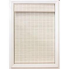 a white window with a bamboo blind in the front and side panels on the back