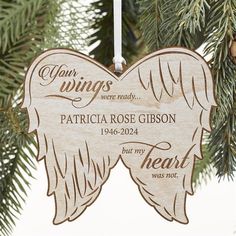 an ornament hanging from a christmas tree with the words, your wings were ready