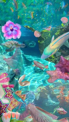 an underwater scene with fish and flowers in the water, surrounded by other marine life