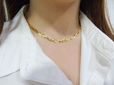 This triple braided chain choker necklace, provides us elegance. It has a minimalist finish and together with its flat snake chain it is perfect to be able to combine it with all your looks. Choker jewelry is ideal to give a simple and original feeling to your styles.  * Material: 316L stainless steel * Finish: 316L stainless steel Gold Color * Length: 32+6cm, 38+5cm, 43+5cm * Chain thickness: 5 mm The packaging with which our jewels are sent is a handmade box. You also have the gift option available. We invite you to our shop www.etsy.com/shop/OSYAM Herringbone Choker Necklace For Gift, Gift Herringbone Choker Necklace, Snake Chain Necklace Choker For Gift, Snake Chain Choker Necklace Perfect For Gifts, Modern Necklaces With Wheat Chain As Gift, Modern Wheat Chain Necklaces As Gift, Modern Wheat Chain Necklace As A Gift, Modern Wheat Chain Necklace As Gift, Adjustable Herringbone Snake Chain Necklace