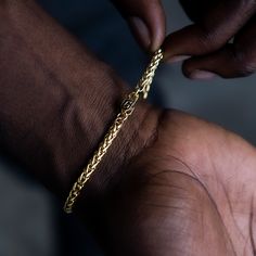 Introducing the Palm Chain Bracelet in Yellow Gold, the bolder 4mm version. This versatile 18k Yellow Gold bracelet features a braided rope design that will instantly level up your look. This piece is ideal for stacking and accessorizing any outfit- day or night. Pair it with the Palm Chain in 4mm for the perfect matching set! This product is guaranteed for life – GLD will repair or replace the item should you experience any defects in craftsmanship or breakage. Specifications - Width: 4mm - Len Everyday Yellow Gold Rope Chain Bracelet, Yellow Gold Link Bracelet With Wheat Chain, Everyday Yellow Gold Jubilee Braided Bracelet, White Gold Bracelet, Braided Rope, Rope Design, Vermeil Jewelry, Custom Earrings, Yellow Gold Bracelet