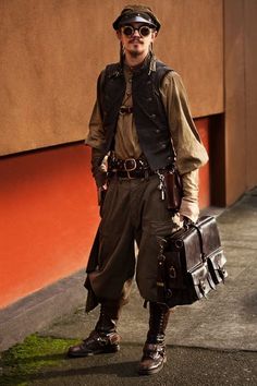 Wow, this guy just looks awesome. What a super cool outfit. This is Marcusstratus posing on the streets of Portland, OR for student photographer Anna Bart. SteamPUNK - ☮k☮ Victorian Steampunk Men, Steampunk Cosplay Men, Steam Punk Fashion Mens, Steampunk Clothing Male, Steampunk Inventor, Steampunk Adventurer, Steampunk Pilot, Steampunk Gentleman, Victorian Steampunk Fashion