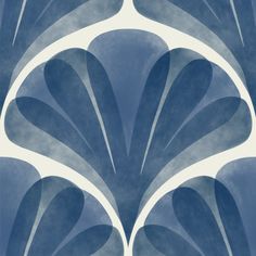 an abstract blue and white wallpaper with large leaves on it's back side