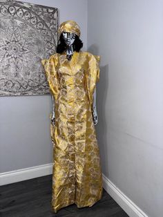 African/Nigeria bubu brocade outfit. One size. Small sized scarf. Oversized,And  Please note measurements: Width: 64inches Lenght: 62inches Traditional Fitted Kaftan With Kimono Sleeves, Traditional Fitted Gold Agbada, Gold Long Sleeve Agbada For Traditional Ceremonies, Traditional Long Sleeve Gold Kimono, Traditional Gold Long Sleeve Kimono, Traditional Gold Kimono For Festive Occasions, Traditional Gold Kimono For Festive Season, Traditional Long Gold Abaya, Traditional Long Gold Kaftan